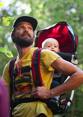 guy hiking with a baby